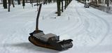 Napakahusay na Utility Snow Transportation Sinusubaybayan ng Snowfox ang Farmers Electric Snowmobile